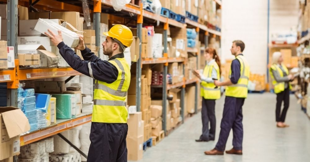 workers arranging warehouse returns