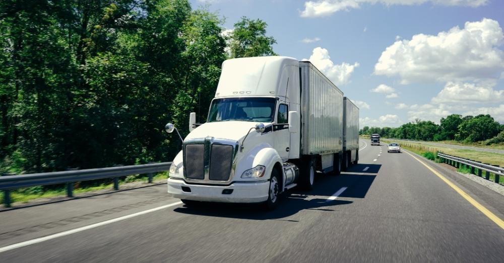 Truck with double dry-vans; Conestoga fleet vehicle.