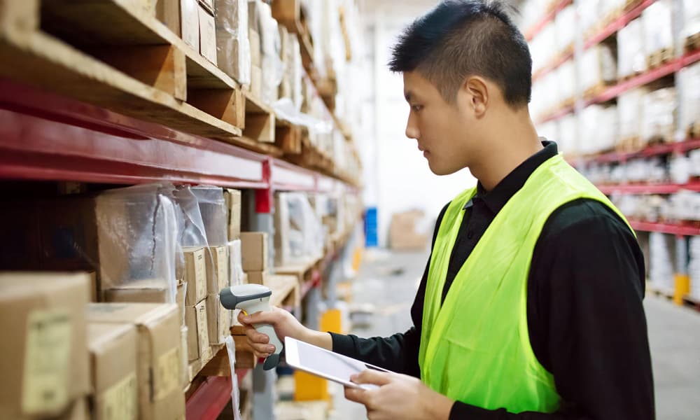 Warehouse personnel scanning inventory