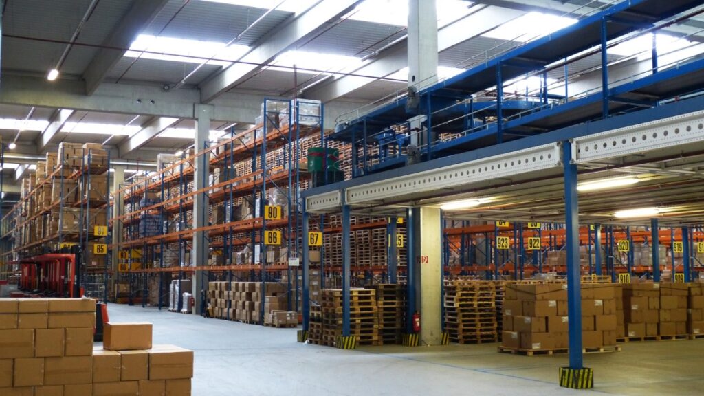 Large warehouse interior with multi-level storage racks