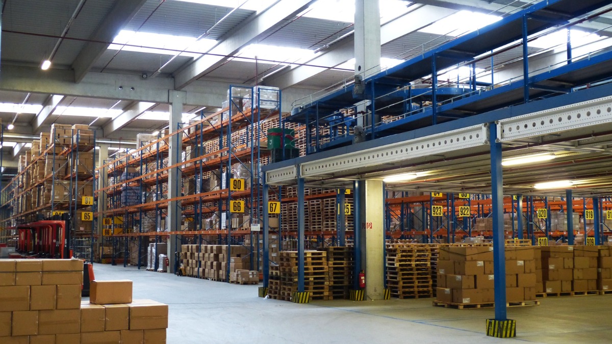 Large warehouse interior with multi-level storage racks